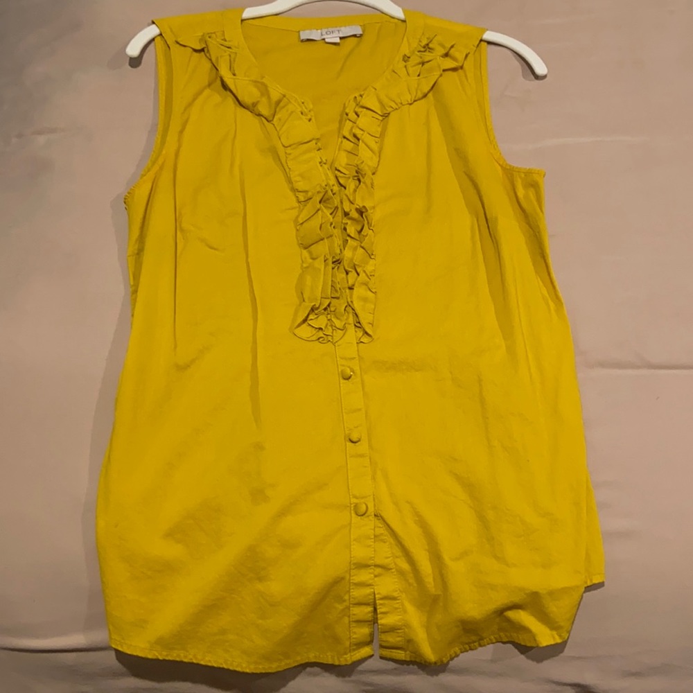 Yellow sleeveless blouse